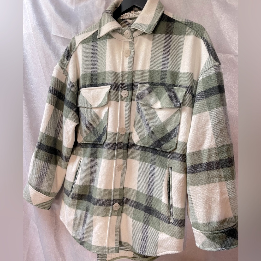 Green plaid button down jacket. Size XS fits like a Med.